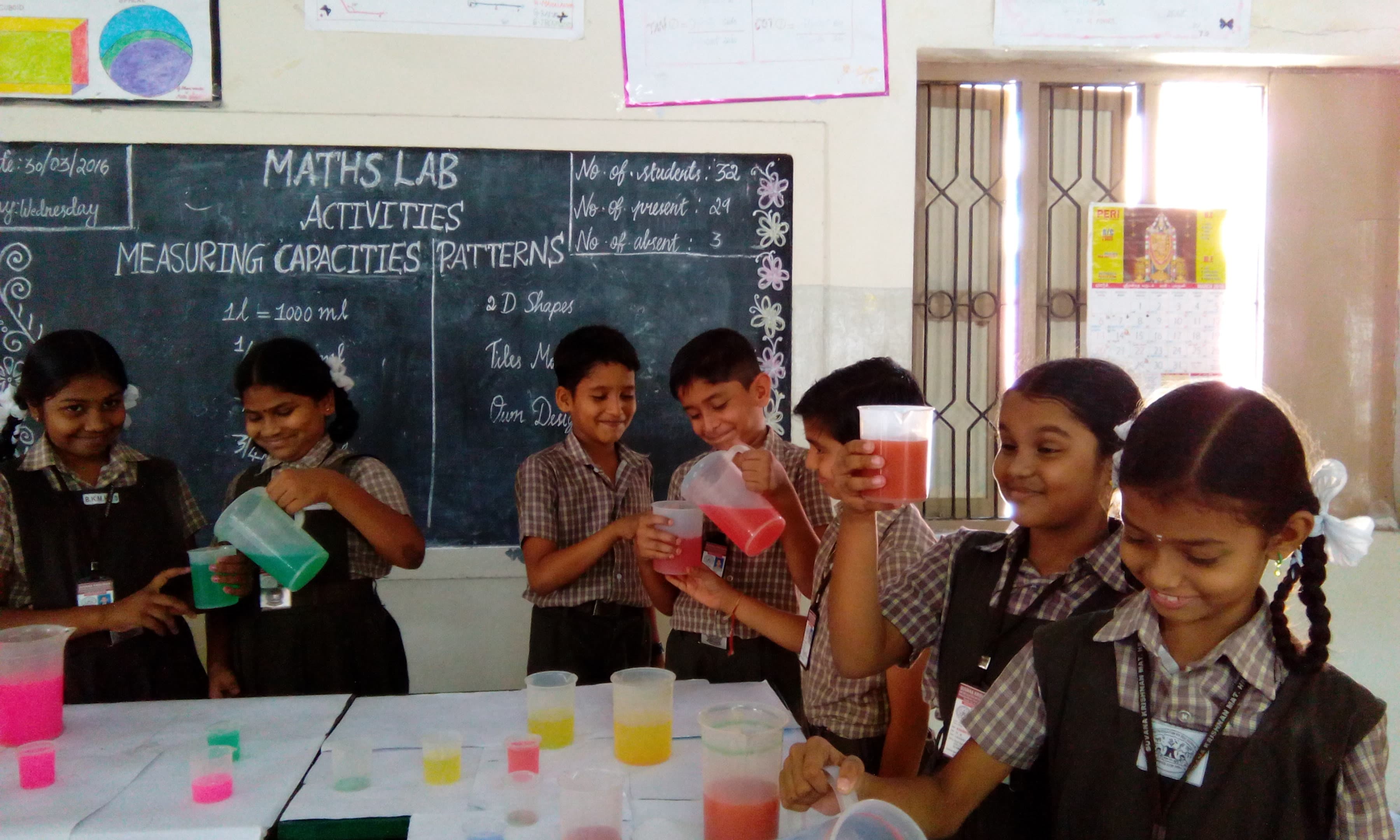 Students using learning materials in the mathematics laboratory